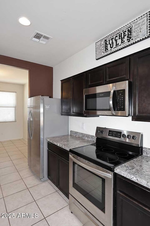 29932 N Paloverde Dr, Florence, AZ 85132 - kitchen featuring stainless steel appliances and light tile patterned flooring