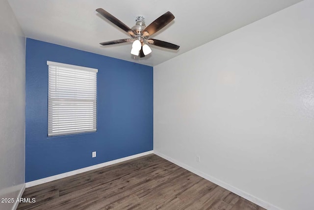 29932 N Paloverde Dr, Florence, AZ 85132 - spare room featuring ceiling fan, wood finished floors, and baseboards
