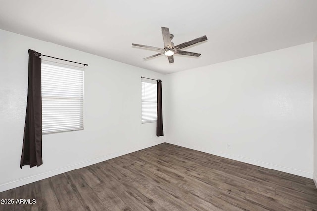 29932 N Paloverde Dr, Florence, AZ 85132 - unfurnished room with wood finished floors, ceiling fan, and baseboards