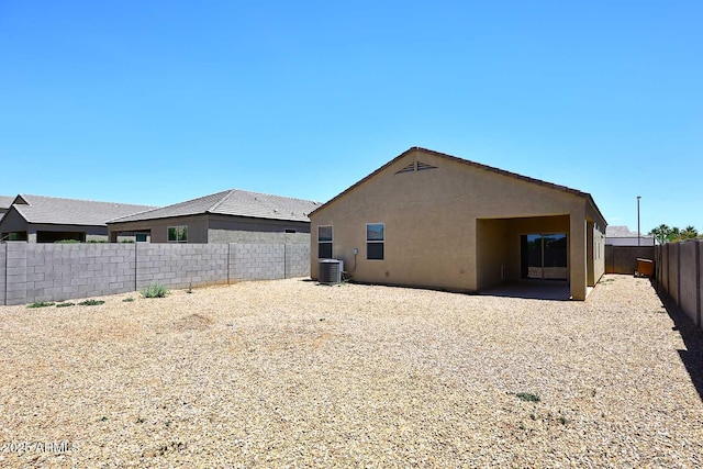 29932 N Paloverde Dr, Florence, AZ 85132 - rear view of property with stucco siding, a fenced backyard, central air condition unit, and a patio