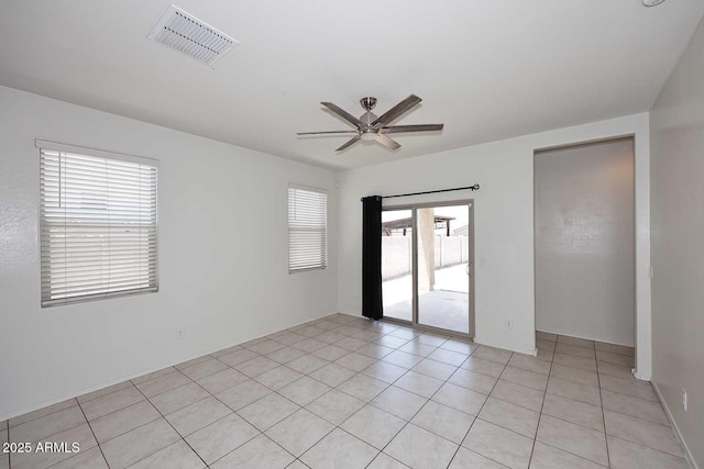 29932 N Paloverde Dr, Florence, AZ 85132 - spare room featuring ceiling fan and light tile patterned floors