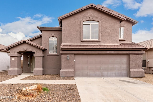 front of property featuring a garage