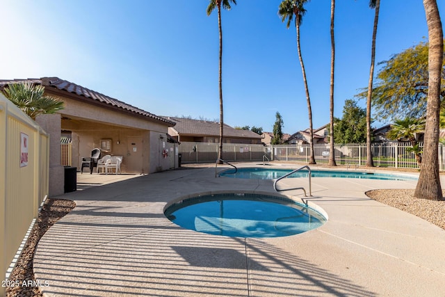 view of pool featuring a patio area