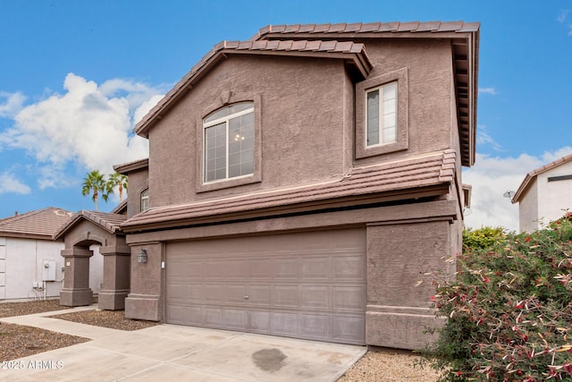 view of property featuring a garage