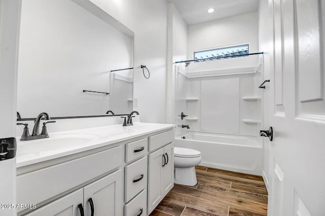 full bathroom featuring vanity, toilet, and shower / bath combination