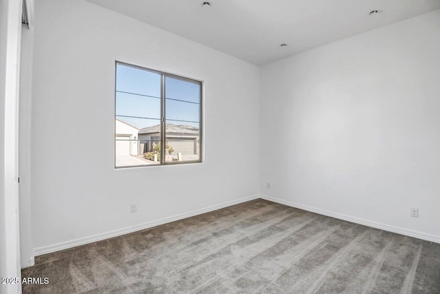 empty room featuring carpet floors