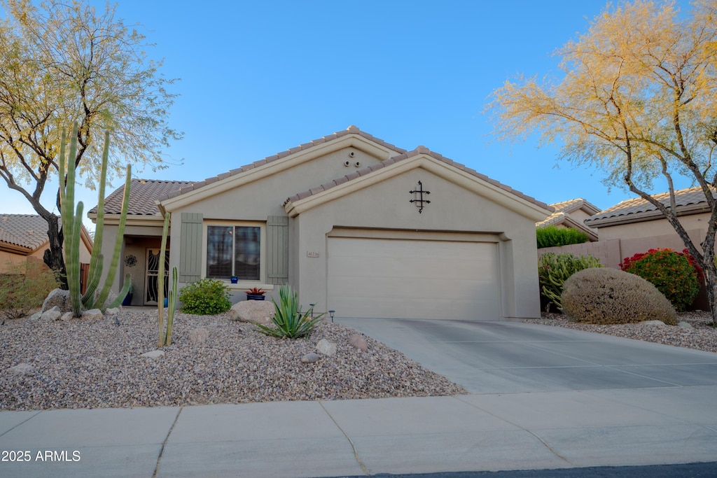 ranch-style house with a garage