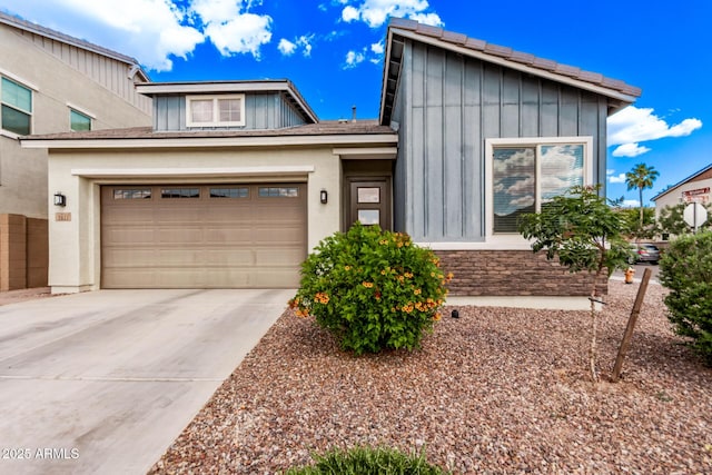 3031 S Valerie Dr, Chandler, AZ 85286 - view of front facade featuring a garage, board and batten siding, and driveway
