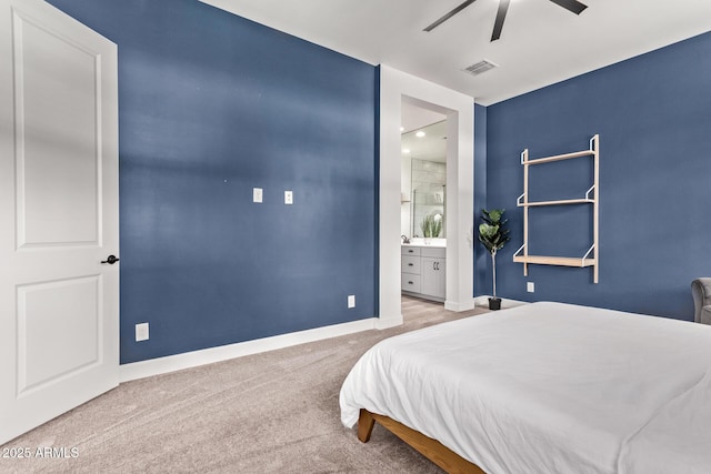3031 S Valerie Dr, Chandler, AZ 85286 - carpeted bedroom featuring visible vents, connected bathroom, ceiling fan, and baseboards