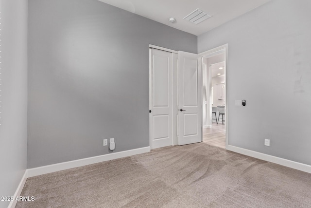 3031 S Valerie Dr, Chandler, AZ 85286 - unfurnished bedroom featuring baseboards, carpet, and visible vents