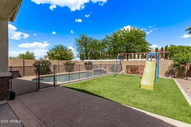 3031 S Valerie Dr, Chandler, AZ 85286 - exterior space featuring a lawn, a fenced backyard, a playground, and a patio area