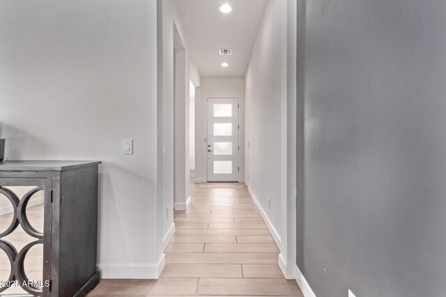 3031 S Valerie Dr, Chandler, AZ 85286 - hall with recessed lighting, baseboards, visible vents, and light wood-style floors