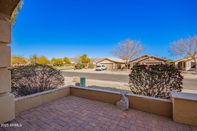 view of patio with a residential view