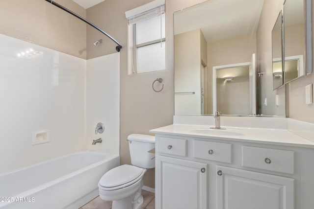 bathroom with shower / bathing tub combination, vanity, and toilet