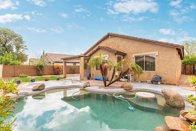 view of pool with a fenced in pool, a fenced backyard, and a patio