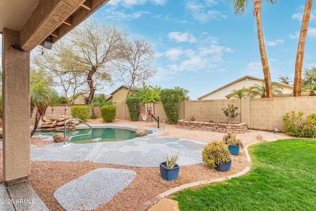 view of swimming pool with a fenced in pool, a fenced backyard, and a patio