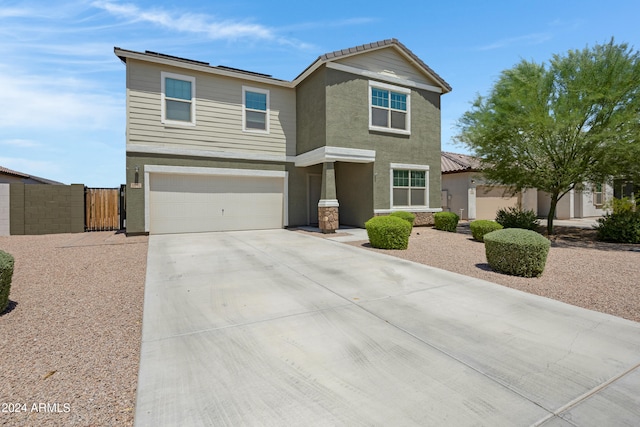 front of property featuring a garage