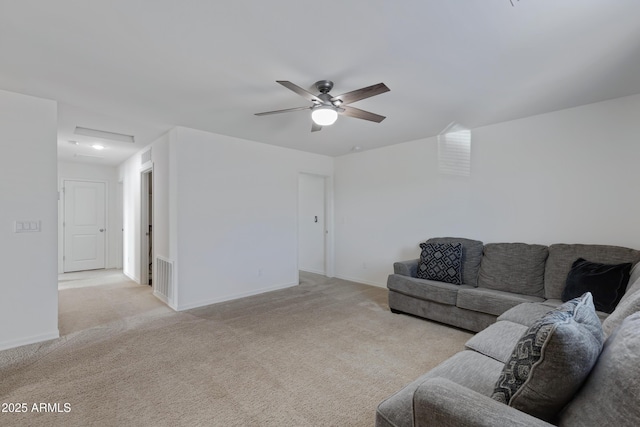 living room featuring ceiling fan and light carpet