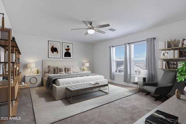 bedroom featuring ceiling fan and light colored carpet