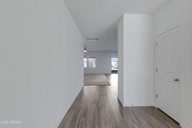 hallway featuring light wood-type flooring