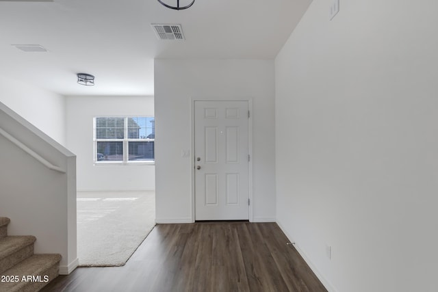 entryway featuring dark wood-type flooring