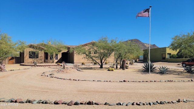 view of front of home with a mountain view