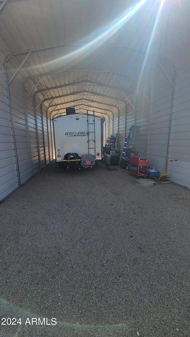 view of parking featuring a carport