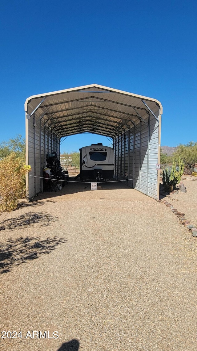 view of parking with a carport