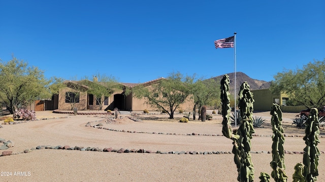 exterior space featuring a mountain view