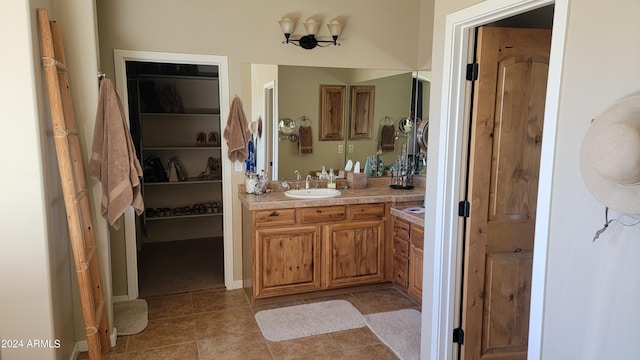 bathroom featuring vanity and tile patterned floors