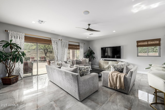 living room featuring ceiling fan