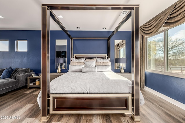 bedroom featuring hardwood / wood-style flooring