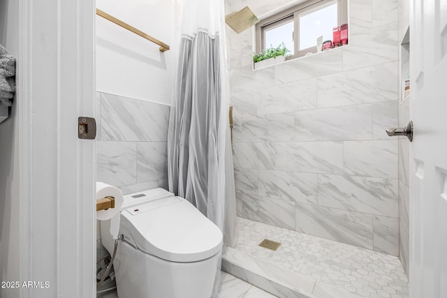 bathroom with curtained shower and tile walls