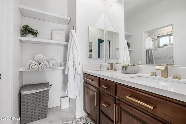 bathroom featuring vanity and curtained shower