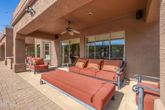 view of patio with an outdoor hangout area and ceiling fan