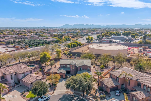 birds eye view of property featuring a mountain view