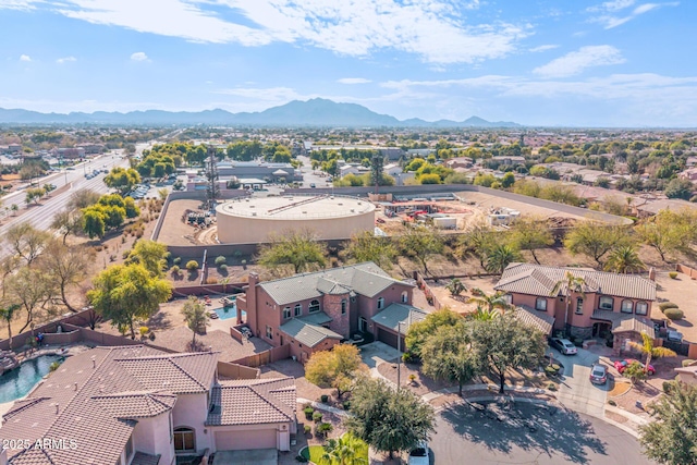 drone / aerial view featuring a mountain view