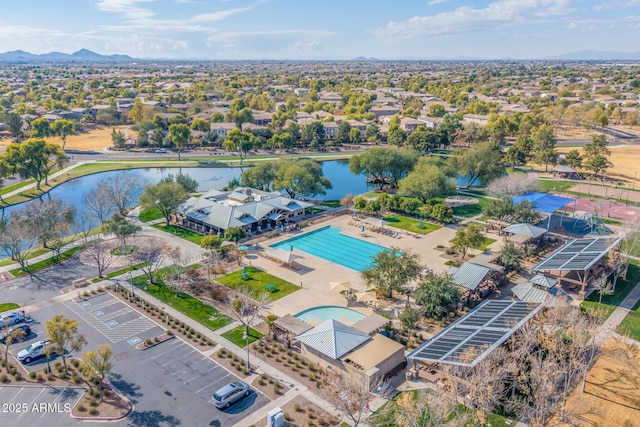 bird's eye view with a water and mountain view