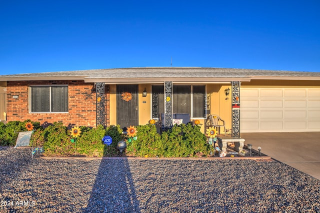 single story home with a garage