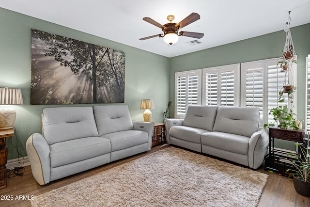 1316 S Minneola Ln, Gilbert, AZ 85296 - living area featuring wood finished floors and ceiling fan