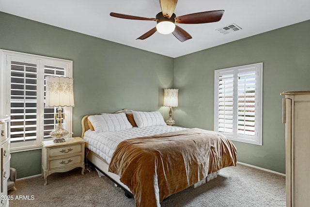 1316 S Minneola Ln, Gilbert, AZ 85296 - carpeted bedroom with baseboards and a ceiling fan