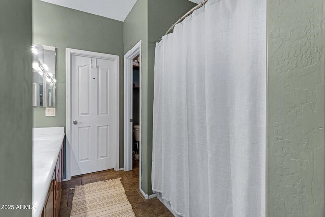 1316 S Minneola Ln, Gilbert, AZ 85296 - bathroom featuring vanity and a textured wall