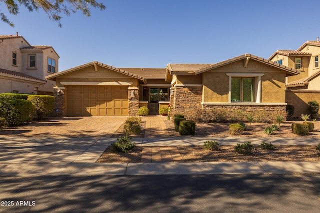 view of front of home with a garage