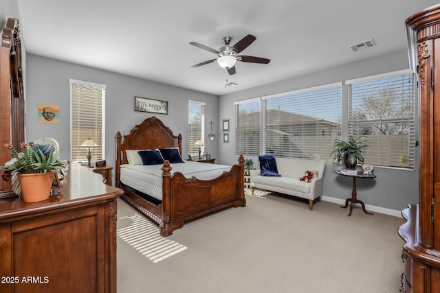 carpeted bedroom with ceiling fan