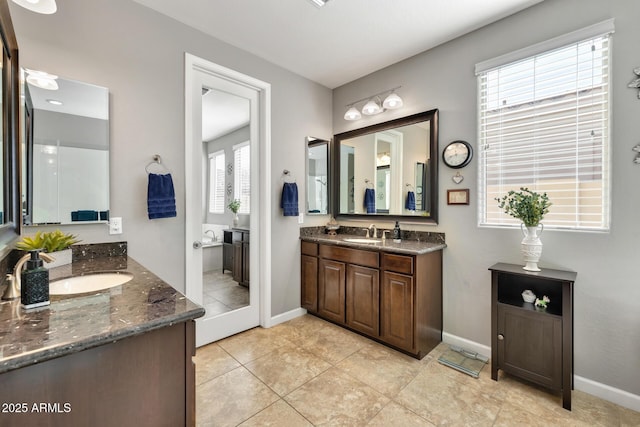 bathroom featuring vanity and tile patterned flooring