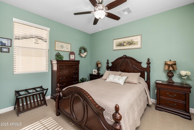 bedroom with light colored carpet and ceiling fan