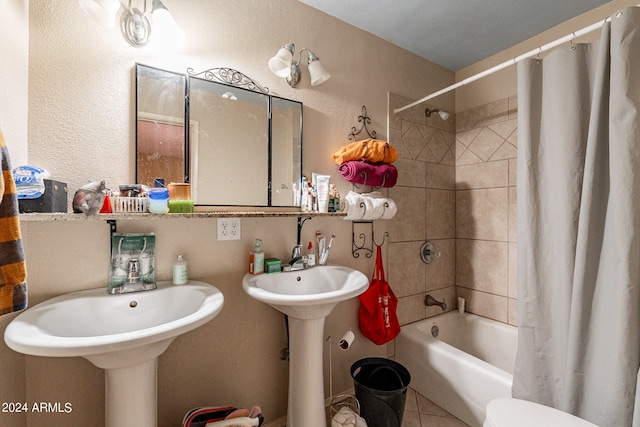 bathroom with shower / tub combo, toilet, and tile patterned flooring