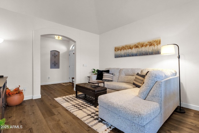 living room featuring dark wood-type flooring