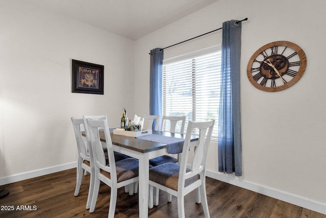 dining area featuring dark hardwood / wood-style flooring