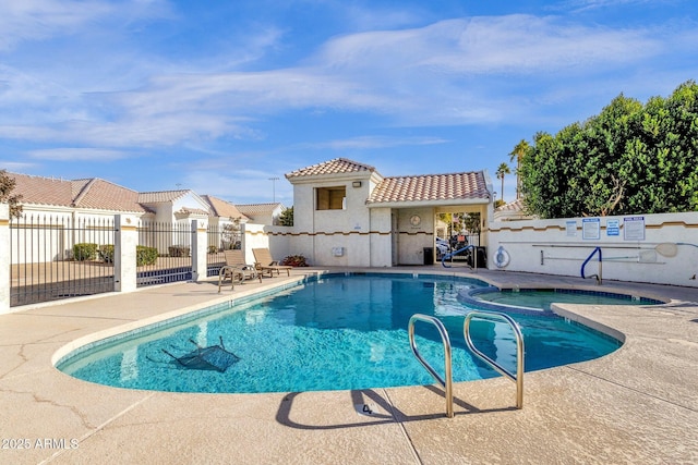 view of pool featuring a patio